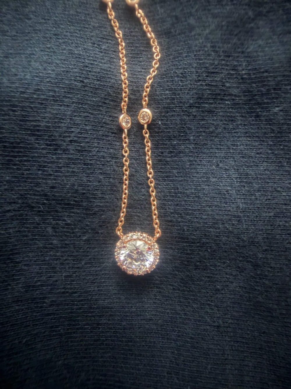 Rose-Tone Halo Pendant Necklace with Sparkling Center